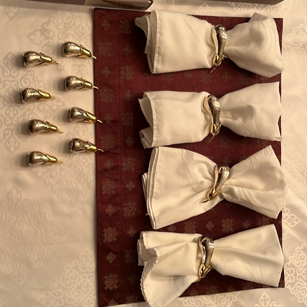 12 napkin rings.  Silver and gold tone eggplant design. 8 matching salt shakers